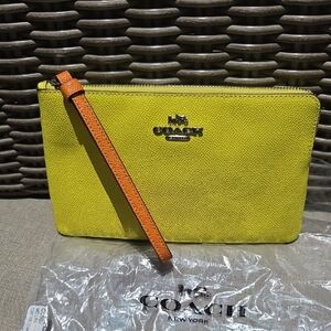 Coach Large Corner Zip Wristlet In Colorblock Bright Yellow Orange